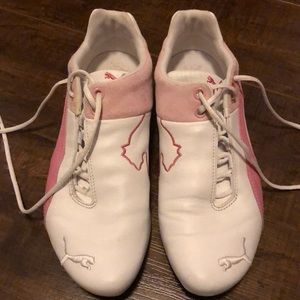 White and pink Pumas